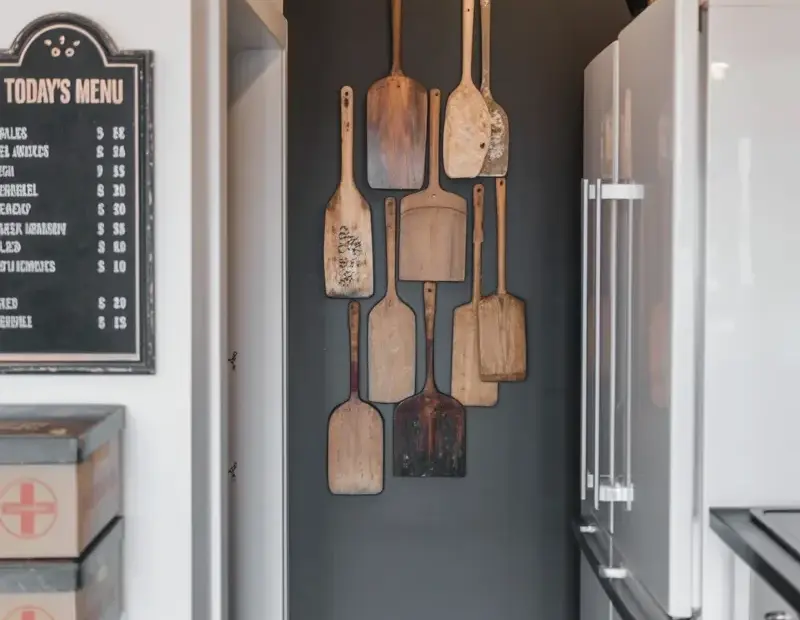Hallway organization idea: vintage menu board and storage for quick entryway tips